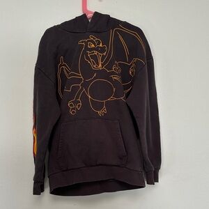 Pokemon Black Hoodie with Orange Charizard Outline